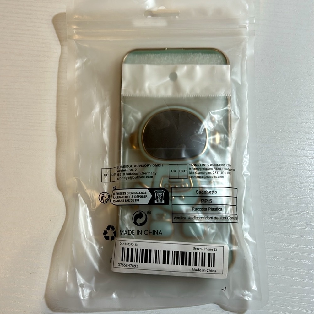 NWT unopened astronaut blue green and gold plastic case iPhone 13